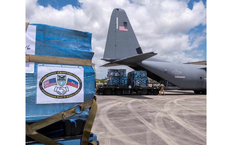 Airmen from the 482d Fighter Wing and Special Operations Command South (SOCSOUTH) join forces with the 317th Airlift Wing, who provided their C-130 Hercules, to load pallets of medical supplies and electrolyte solution at Homestead Air Reserve Base, Fla., on April 26, 2024. This humanitarian aid, contributed by NGOs including Hope to Haiti, Medicine for All People International, and Lift Logistics, was delivered to Port-au-Prince, Haiti, under the coordination of the U.S. Southern Command (SOUTHCOM) through the Denton Program.