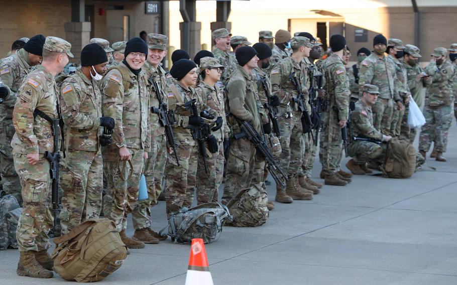 Soldiers from Headquarters and Headquarters Battalion, 101st Airborne Division, gather to get further instructions from company leaders and any last minute tasks to be completed during a deployment readiness exercise on Feb. 8, 2022, at Fort Campbell, Ky. Soldiers from the 101st Airborne are among the 3,000 additional U.S. troops deploying to Poland to help NATO allies fortify their defenses as a possible Russian invasion of Ukraine looms, Army officials said Tuesday, Feb. 15, 2022.