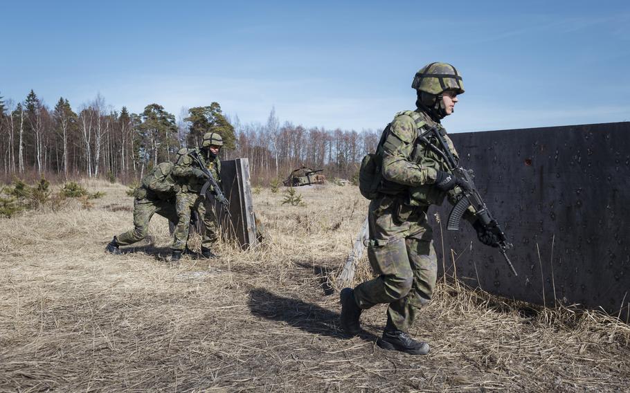 Finnish troops participate in a military exercise on the island of Santahamina on April 20. MUST CREDIT: Photo for The Washington Post by Juho Kuva.