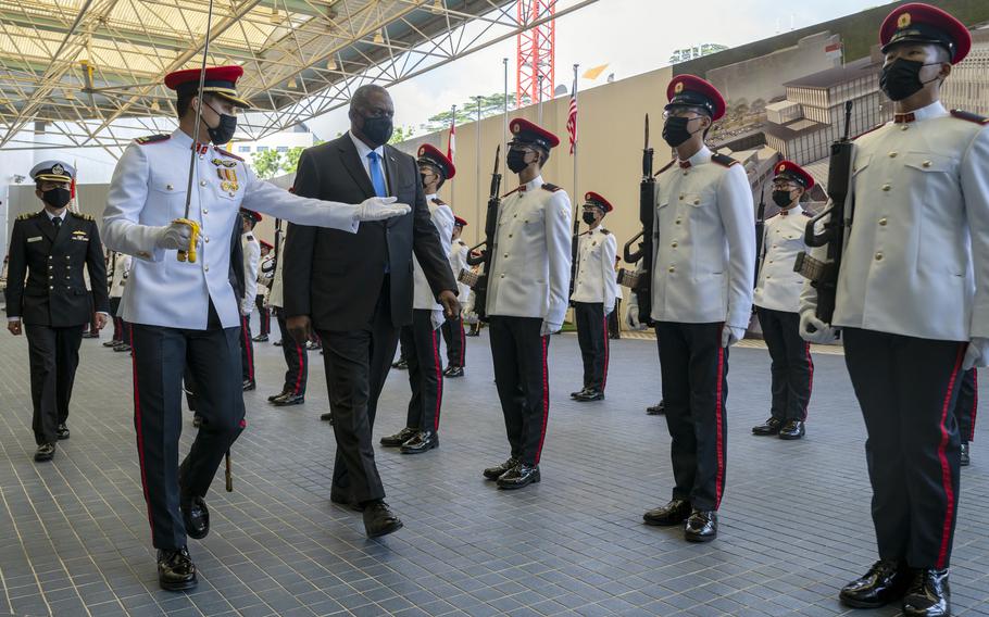 Secretary of Defense Lloyd Austin is welcomed in Singapore, Tuesday, July, 27, 2021.