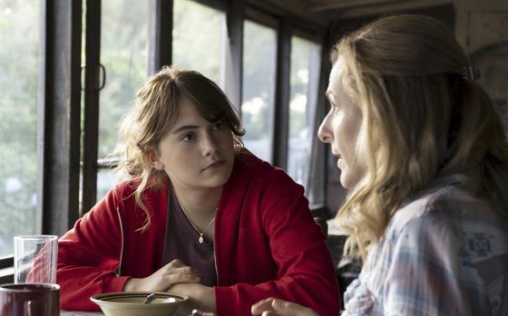 This image released by Apple TV+ shows Emilia Jones, left, and Marlee Matlin in a scene from "CODA." (Apple TV+ via AP)