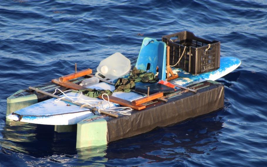 A homemade paddle board floating near Bimini, Bahamas, March. 29, 2022. The two people rescued are expected to be transferred to Royal Bahamas Defence Force authorities.