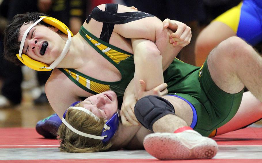 Edgren's Nikolas Hawkins pins CAJ's Xavier Van Dam at 160 pounds.