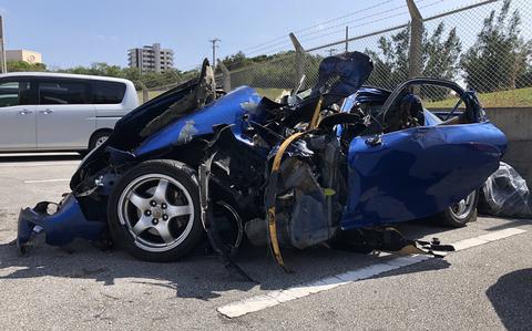 A U.S. civilian working at Camp Lester died Monday, Feb. 12, 2024, after his car, pictured here at Okinawa Police Station the next day, ran up a curb and struck a roadside tree.