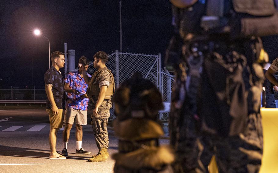 Marines with III Marine Expeditionary Force and Marine Corps Installations Pacific verify liberty documents at Camp Hansen, Okinawa, July 19, 2024.