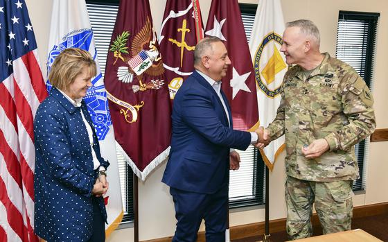 Gilbert Cisneros Jr., under secretary of defense for personnel and readiness, center, and Seileen Mullen, acting assistant secretary of defense for health affairs, visit the U.S. Army Medical Center of Excellence in Texas, May 12, 2022.