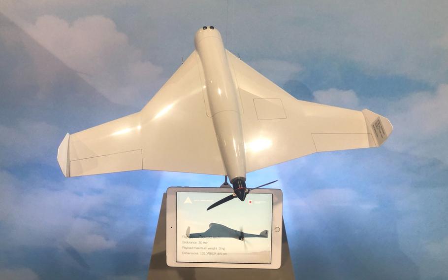 A model of an unmanned combat aerial system manufactured by the Kalashnikov Group and ZALA Aero Group, is on display at the International Defense Exhibition in Abu Dhabi, United Arab Emirates, in February 2019. According to reports in March 2022, photos have surfaced on social media of a roughly four-foot-wide tan, airplane-shaped drone that had fallen out of the sky in Ukraine’s Kyiv region.