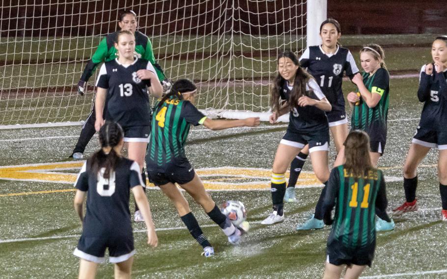 Robert D. Edgren's A'mya Ross unleashes the second of her two goals against Zama during Friday's DODEA-Japan girls soccer match. The Eagles won 2-0, their first win in eight matches this season.