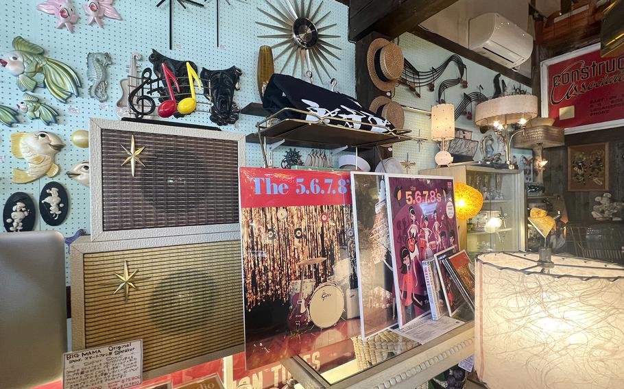 Records and radios fill the front counter at Big Mama on Base Side Street in Fussa, Japan.