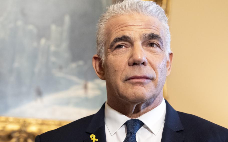 A man in a suit.