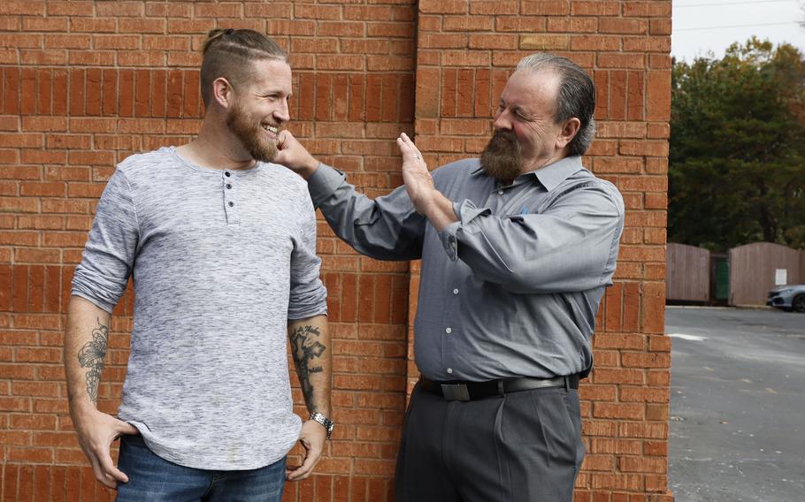 U.S. veteran Chris (left) shares a laugh with his mentor Dan Hydrick (right) on Nov. 2, 2022. Chris, an Army veteran who lives in Cobb, was one of his mentees in the treatment court program and asked that details of his case and his last name not be used in this report.