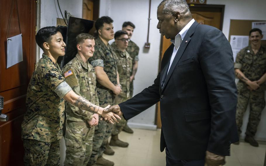 Secretary of Defense Lloyd Austin greets service members assigned to Camp Navarro in Zamboanga, Philippines, Wednesday, Feb. 1, 2023.