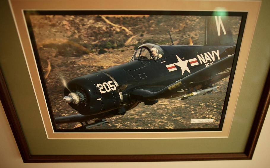 A photograph from 2012 of Charles “Obie” O’Brien flying the very same plane — a Corsair F4U — he flew combat missions in during the Korean War. 