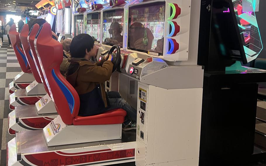 Round1 patrons play arcade games at the lcoation in Musashimurayama, Japan, Jan. 8, 2023. 