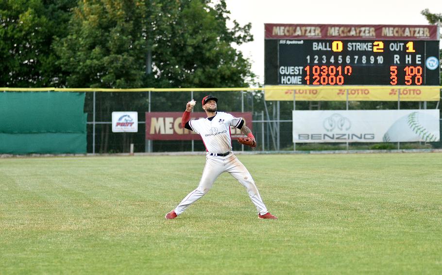Stuttgart left fielder Danilo Weber throws the ball to the infield after a hit in the sixth inning during the Reds' home game against Heidenheim on June 9, 2023, at TVC Ballpark in Stuttgart, Germany. The game pitted two teams vying for playoff spots, with the Heidekoepfe defeating the Reds, 9-7.