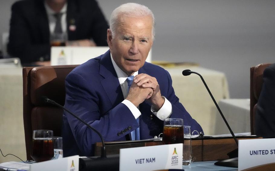 President Joe Biden speaks while sitting next to other leaders during the Asia-Pacific Economic Cooperation (APEC) conference, Thursday, Nov. 16, 2023, in San Francisco.