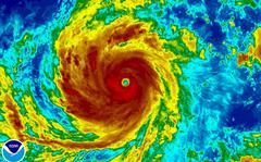Super Typhoon Soudelor is seen in an enhanced infrared NOAA satellite image taken in the Western Pacific Ocean at 08:32 ET (12:32 GMT) August 4, 2015.  Soudelor, deemed the strongest storm of 2015, is expected to cross the northern Philippines on Wednesday morning before powering towards South Japan, Taiwan, and eastern China later this week.  REUTERS/NOAA/Handout   FOR EDITORIAL USE ONLY. NOT FOR SALE FOR MARKETING OR ADVERTISING CAMPAIGNS