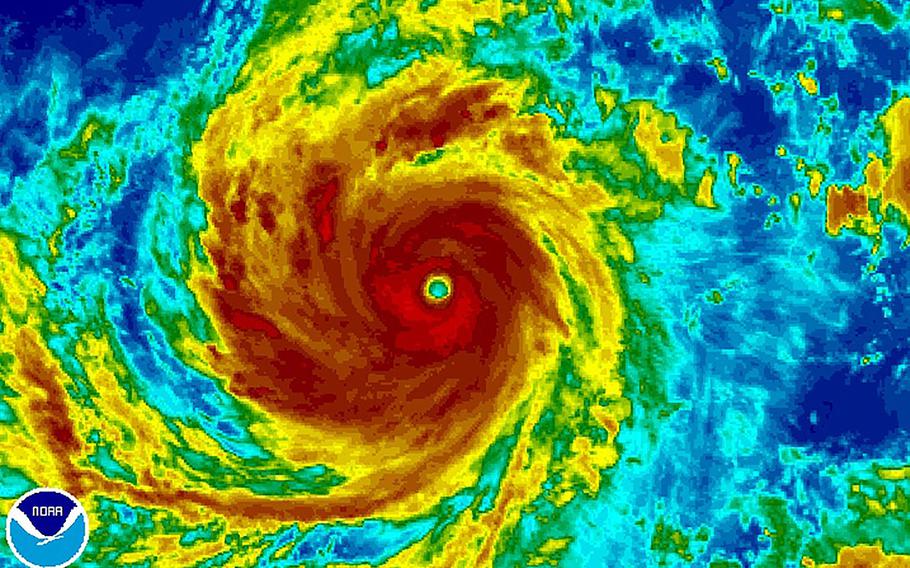 Super Typhoon Soudelor is seen in an enhanced infrared NOAA satellite image taken in the Western Pacific Ocean at 9:32 p.m. Japan/Korea time Aug. 4, 2015.