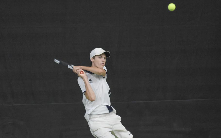 Marymount’s Leonardo Proietti lobs the ball during a battle with Ramstein’s Tristan Chandler for the singles title at the DODEA European tennis championships on Saturday, Oct. 22, 2022. Chandler prevailed against Proietti in an endurance match, 6-2, 3-6, 6-3.