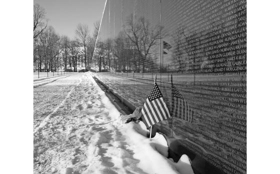 Washington, D.C. Jan. 22, 2014: The Vietnam Veterans Memorial in Washington, D.C. after a snowstorm.

META TAGS: Vietnam Wall; Vietnam War; memorial; 