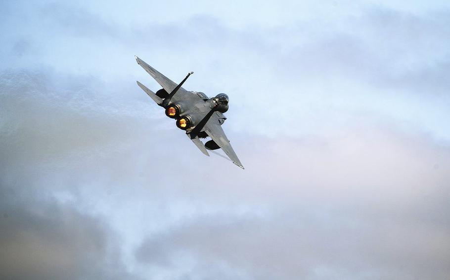 A Boeing F-15E Strike Eagle combat aircraft takes off from Royal Air Force Lakenheath, U.K., on June 27, 2019.