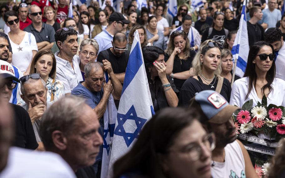 Family and friends mourn during the funeral of Israeli soldier Sgt. Roni Eshel, 19, in Kfar Saba, Israel, on Sunday. Eshel was killed in Hamas militants' incursion into Israel on Oct. 7 but was presumed missing until her remains were identified on Thursday.