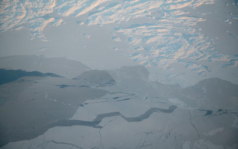 Ice forming as seen from the window of an airplane heading from Iqaluit to Pond Inlet, Nunavut, Canada, on Nov. 10, 2021.