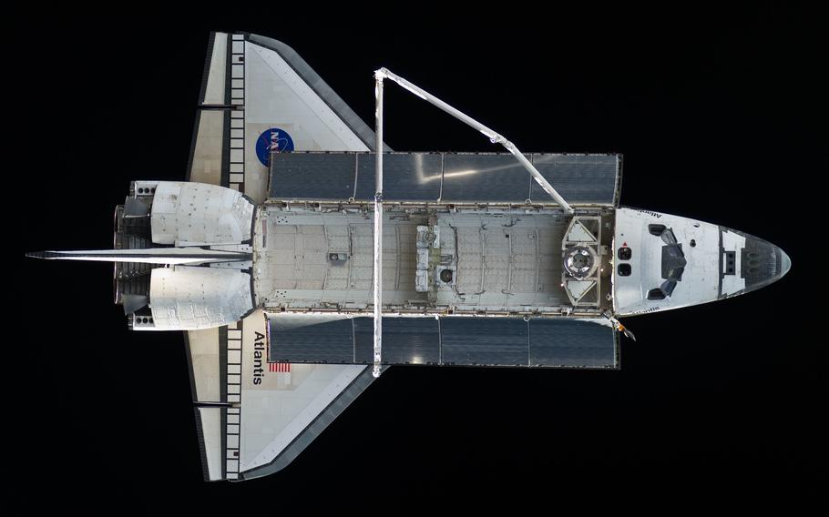 Space shuttle Atlantis is featured in this image photographed by an Expedition 23 crew member on the International Space Station soon after the shuttle and station began their post-undocking relative separation in 2010. Three NASA astronauts including two of the last people to ever fly on a space shuttle are headed to the United States Astronaut Hall of Fame.