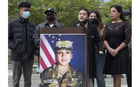 Backed by other family members and attorney Natalie Khawam, right, Spc. Vanessa Guillen's sister, Lupe, speaks at a news conference marking the first anniversary of the Fort Hood soldier's killimg, April 22, 2021 at the Navy Memorial in Washington, D.C. 