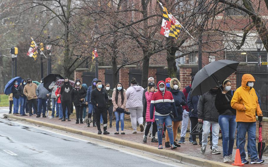 A scene from December 2021 in downtown Annapolis, Md., as people line up at coronavirus testing site. 