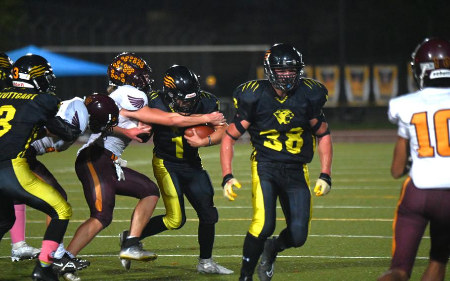 Stuttgart’s Ty Jones gets the offense going on the ground with his rush in the first half of the Division I championship game against the Vilseck Falcons on Oct. 28, 2023, at Stuttgart High School.