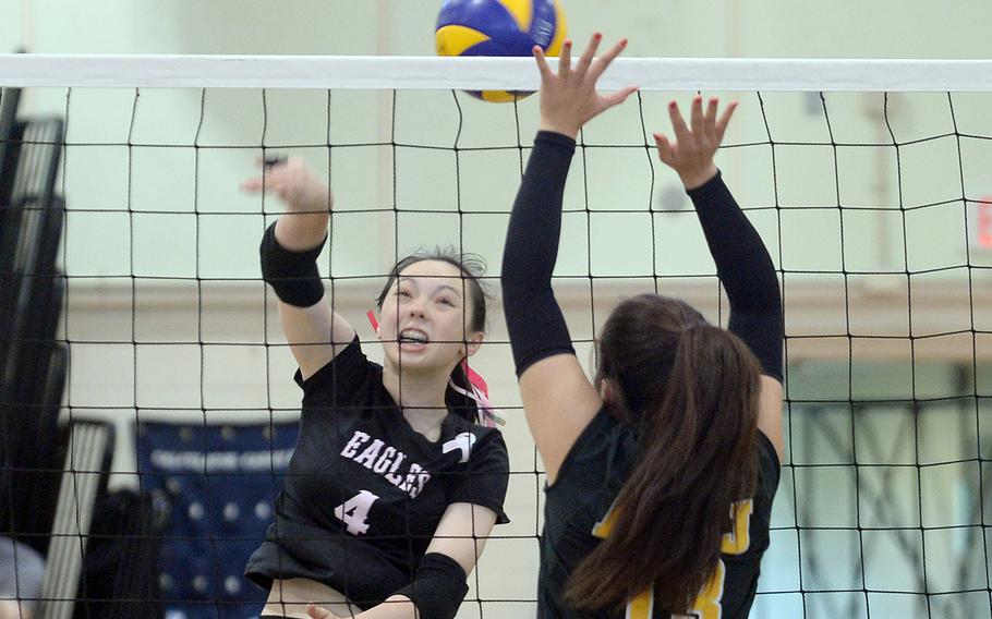 Robert D. Edgren's Milan Bean hits against American School In Japan's Aisha Rakyan during Thursday's pool-play match in the Ryukyu Island Tournament. The Eagles won in straight sets.