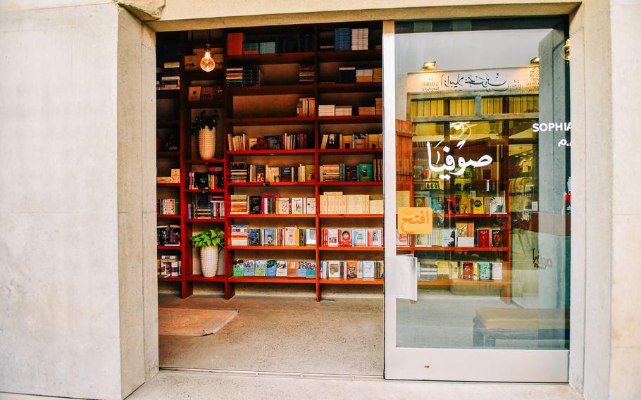 Sophia bookstore is nestled in the souk in Muharraq, Bahrain, and also offers a cafe for shoppers. The richly textured facade of storefronts feels both futuristic and traditional.