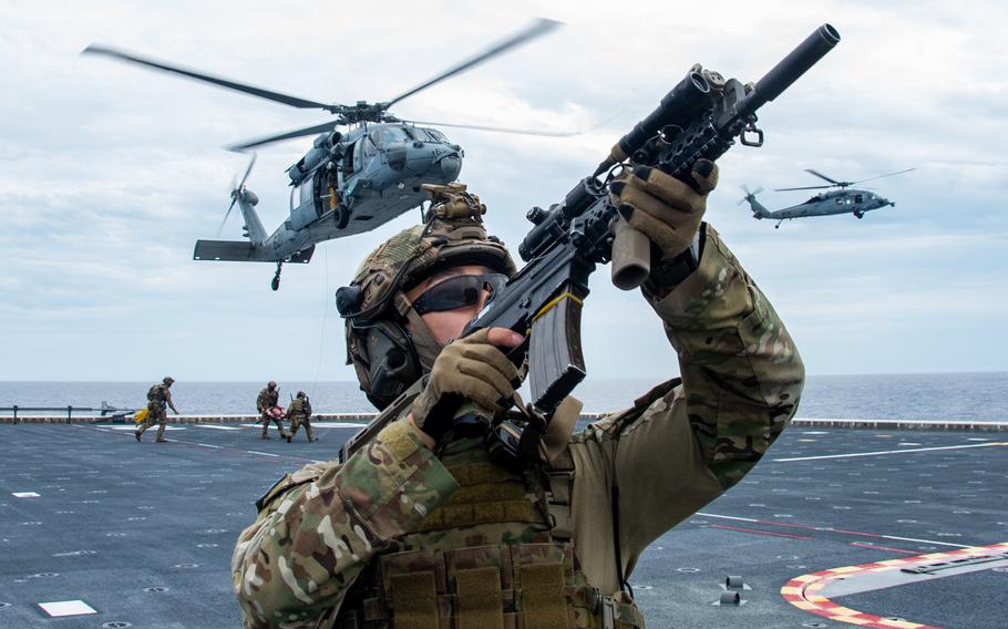 Sailors from the USS Ronald Reagan train with South Korean special forces aboard ROKS Marado in the Philippine Sea, June 3, 2022. 