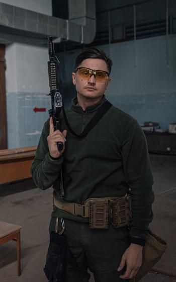 Sasha, 35, a casting director and amateur kickboxer, at a private military training course in Kyiv on March 26. 