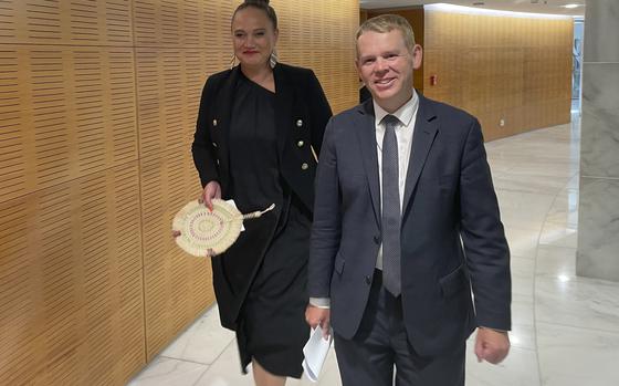 Chris Hipkins, right, and Carmel Sepuloni arrive for a press conference at Parliament in Wellington, Sunday, Jan. 22, 2023. Hipkins was confirmed Sunday as New Zealand's next prime minister and he chose Sepuloni as his deputy, marking the first time a person with Pacific Island heritage has risen to that rank. 