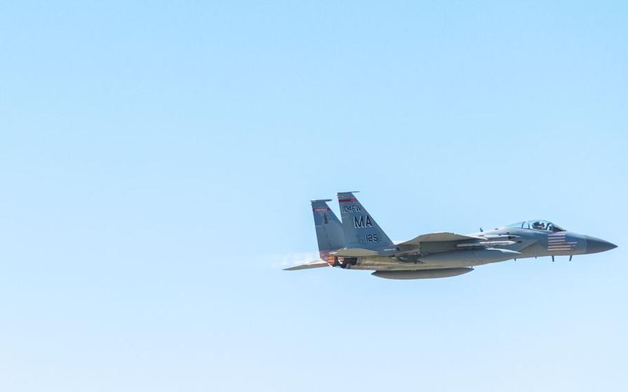 The F-15C Eagle Aircraft flyover at the ceremonial groundbreaking of a new Taxiway Sierra at Westfield-Barnes Regional Airport on Thursday, May 27, 2021.