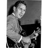 Masahiko Nakamura/Stars and Stripes
Tokyo, October, 1965: Country music star Chet Atkins, one of the kings of the Nashville Sound, plays for members of the press at the Tokyo Prince Hotel during an all-star tour of Japan that featured several shows on U.S. bases.