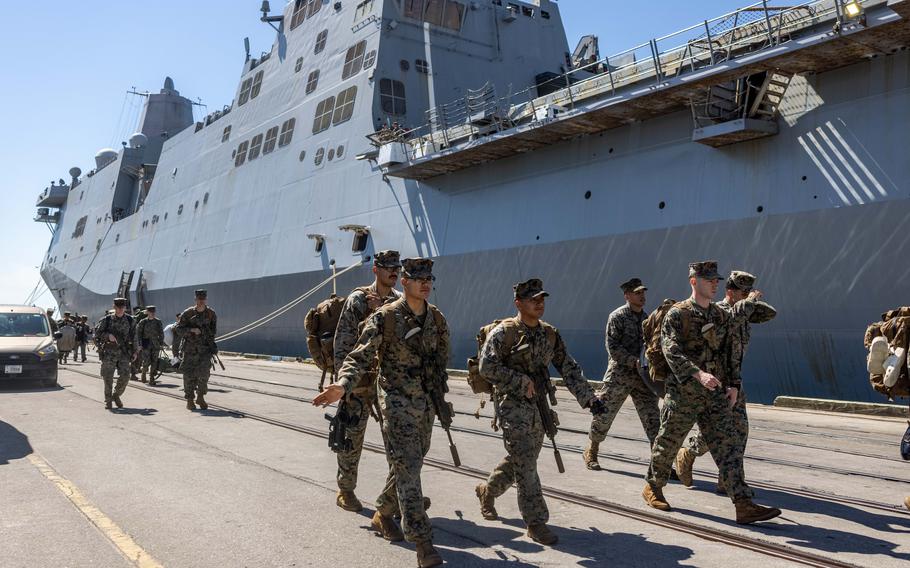 U.S. Marines offload from San Antonio-class amphibious transport dock ship USS Mesa Verde (LPD 19) after returning from deployment with the 26th Marine Expeditionary Unit (Special Operations Capable), Morehead City, N.C., Sunday, March 17, 2024. Marines and sailors assigned to the 26th MEU returned home after completing an eight-month deployment embarked aboard the Bataan Amphibious Ready Group