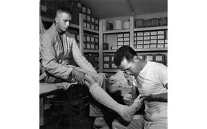 121st Evacuation Hospital, South Korea, August 1957:  Spec. Paul W. Sebesky prepares a leg cast at the 121st Evacuation Hospital in South Korea, The hospital – commanded by Maj. Thomas G. Nelson – admits nearly 700 patients a month through its doors for resident treatment. More serious cases, approximately 170 per month, are evacuated to Japan. With a primary medical mission of supporting all United Nations Forces in Korea, the hospital specializes in neurosurgery and the treatment of infantile paralysis, hemorrhagic fever, and hepatitis. In addition, medical teams from the hospital treat about 2,500 men with minor medical ailments at the servicemembers’ unit areas. 

Looking for Stars and Stripes’ historic coverage? Subscribe to Stars and Stripes’ historic newspaper archive! We have digitized our 1948-1999 European and Pacific editions, as well as several of our WWII editions and made them available online through https://starsandstripes.newspaperarchive.com/

META TAGS:World Health Worker Week; military medical; hospital; health care; ASCOM; Army Support Command; U.S. Army; UN