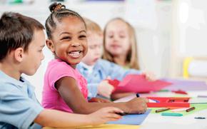 A child smiles.