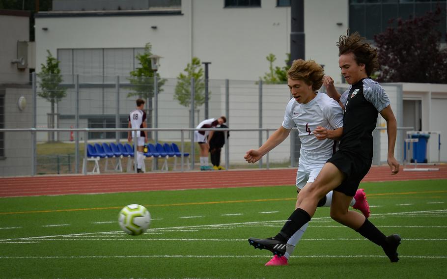 Stuttgart’s Ryan Stevenson steals the ball from a Lakenheath Lancer during pool play at the DODEA-Europe Division-I Soccer Championships on Ramstein Air Base, Germany, May 16, 2022. The Stuttgart panthers sank seven toward a 7-0 win against Lakenheath and will face off against Kaiserslautern High School. 