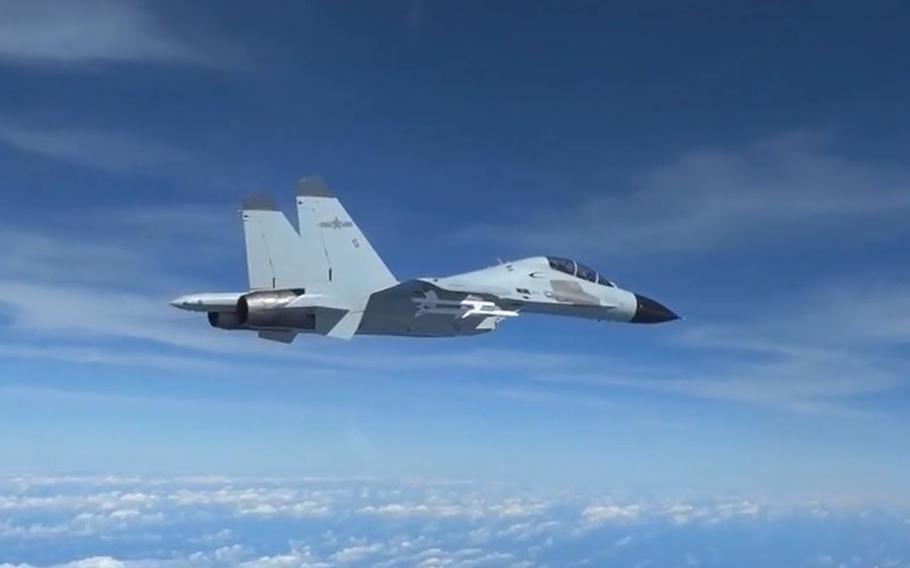 U.S. officials said a People’s Liberation Army Navy J-11 fighter maneuvered within about 10 feet of a U.S. RC-135 Rivet Joint reconnaissance plane’s wing during the intercept Dec. 21.