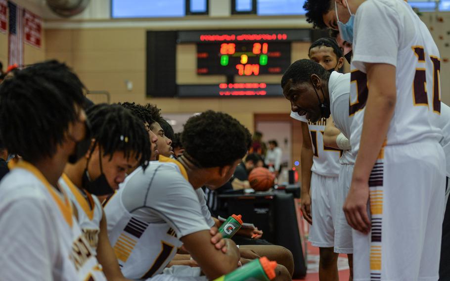 Coach Dewayne Pigge' of the Baumholder Buccaneers gives feedback to his team during a tight score against Ansbach at the DODEA-Europe Division III boys basketball title game in Kaiserslautern, Germany, on Saturday, Feb. 26, 2022.