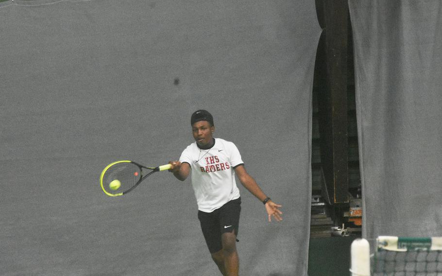 Amaree Barrier of Kaiserslautern uses a forehand shot during a boys double semifinal on Friday, Oct. 22, 2021, at the DODEA-Europe tennis championships.