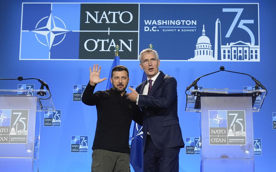 Ukraine’s President Volodymyr Zelenskyy and NATO Secretary General Jens Stoltenberg speak during a press conference at the NATO summit in Washington on Thursday, July 11, 2024. 