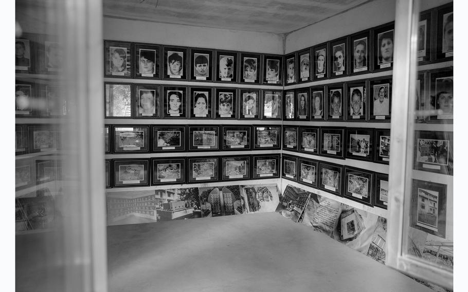 Images of Fadil Muqolli’s family are preserved in their home, where 53 people were killed on April 17, 1999. For the past 24 years, Muqolli has preserved the house as a memorial to his family and to the war that’s open to the public. 