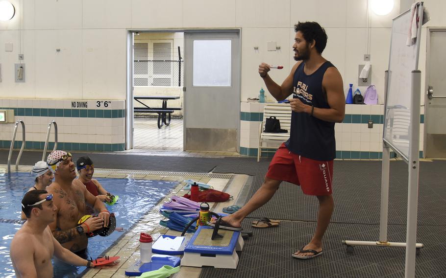 Swimming coach Sho Shimazaki teaches the master’s advanced swimming course at Yokota Air Base, Japan, Friday, May 27, 2022.