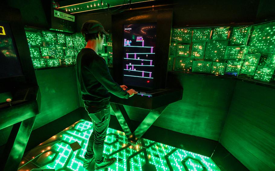 One of the Ladder’s designers, Tommy Wallach, plays Bossy Kong, an 80’s-themed video game in the escape room on April 2 in Los Angeles. 