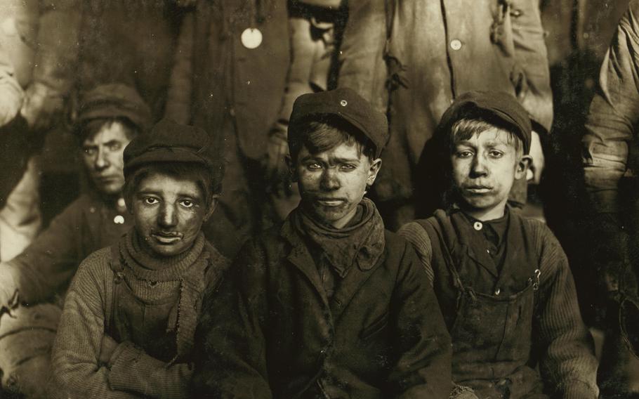The “breaker boys” at a Pennsylvania coal mine, photographed by Lewis Hine in 1911.